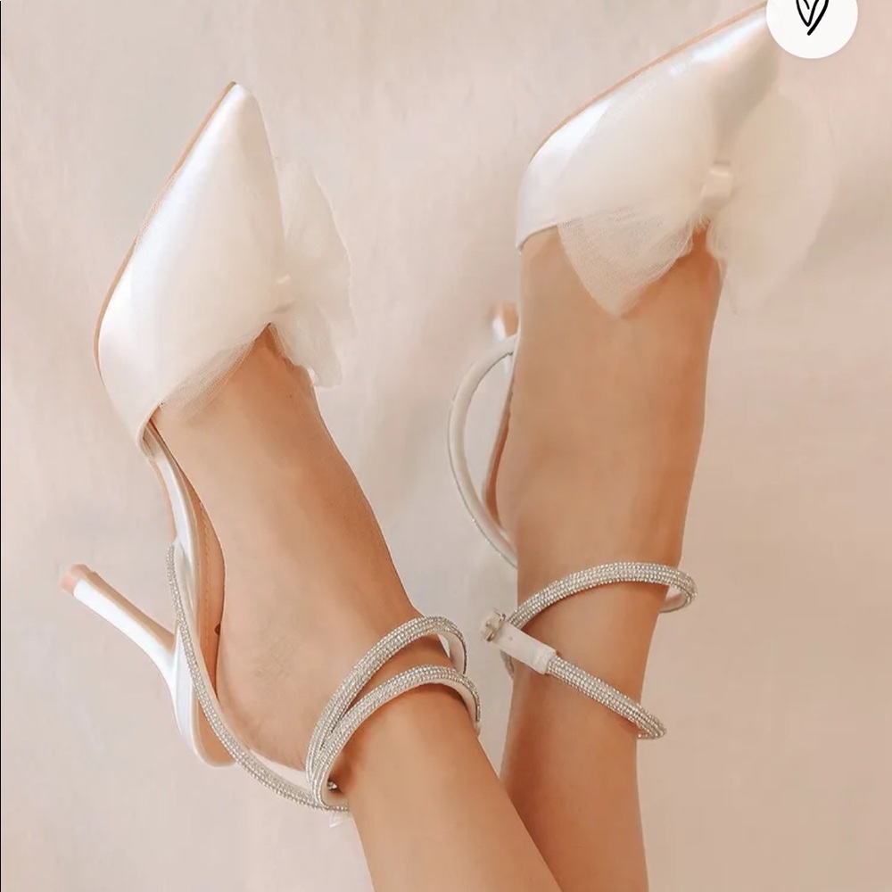 White satin rhinestone bow ankle strap pumps